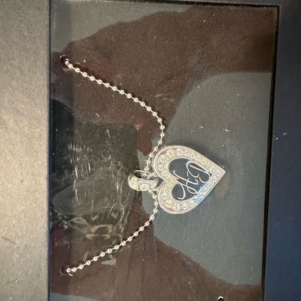 Harley Davidson heart locket necklace. New with tag. Paid $55. Asking $40.